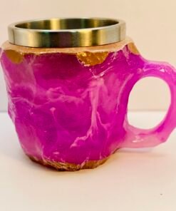 Faux crystal resin coffee cup glowing in light