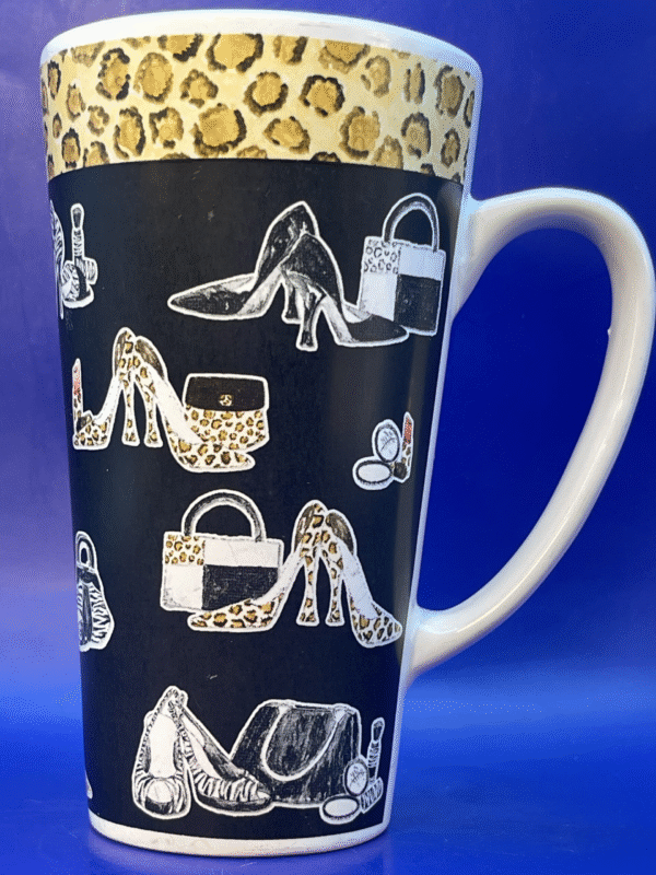 Indulge in the purr-fect blend of style and sophistication with the Shoe and Purse Latte Mug. It’s a shoe lover’s #cupofmood