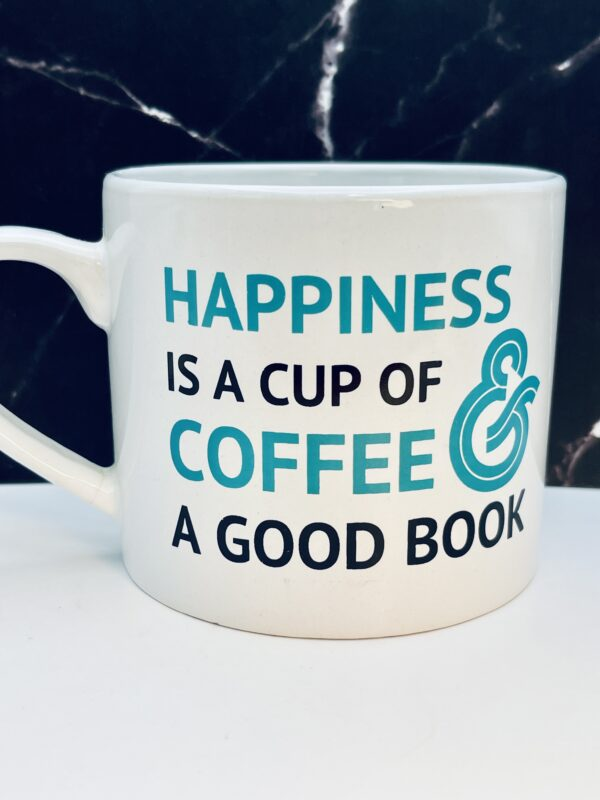 The Happiness Is Coffee & Book Mug is the perfect #cupofmood for the true book lover who cherishes every page and every cozy reading nook.