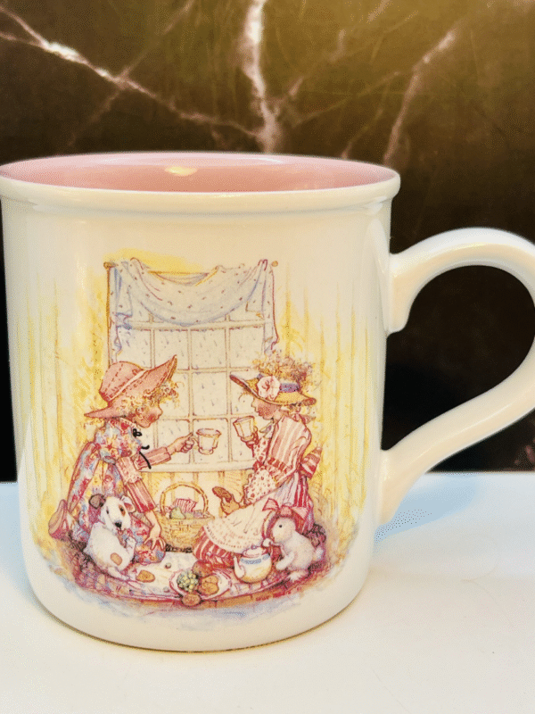 The Vintage Holly Hobbie Moments with Mom Mug captures warmth and nostalgia. It’s the perfect #cupofmood to celebrate friendship, nostalgia, and timeless charm. This unique porcelain mug is a standout collectible in the Holly Hobbie series.
