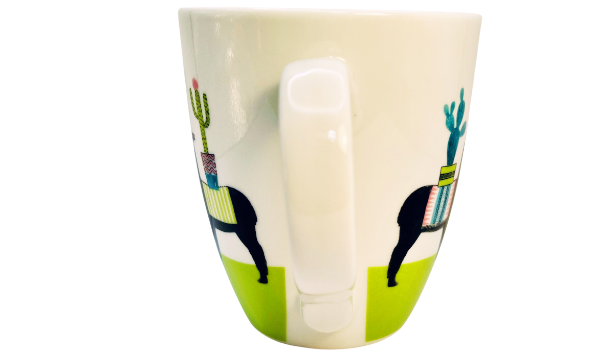 Pfaltzgraff taco llama mug handle view with two llamas colorful blankets and cactus accents