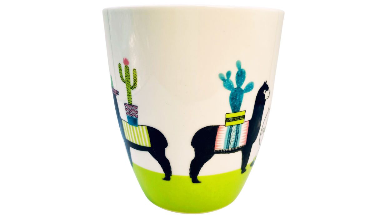 Pfaltzgraff llama mug with black llamas blue and green cacti and colorful Southwestern artwork