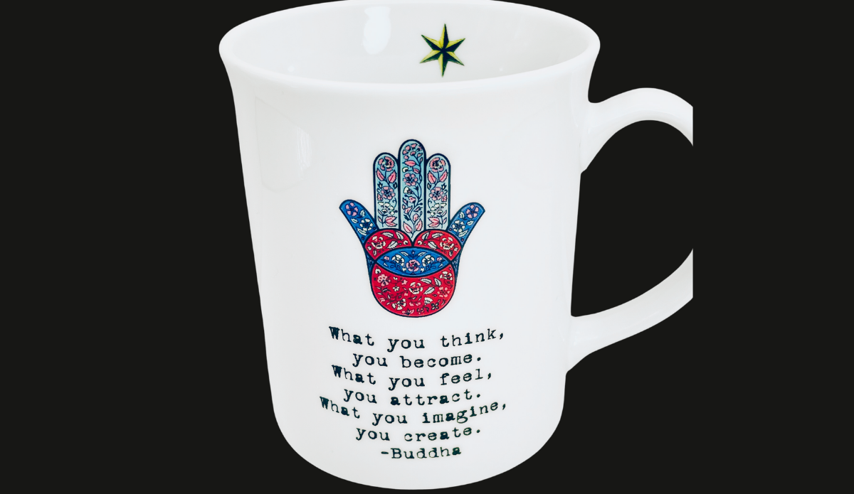Buddha Hamsa Hand Inspirational Mug angled view with inspirational quote and colorful Hamsa design