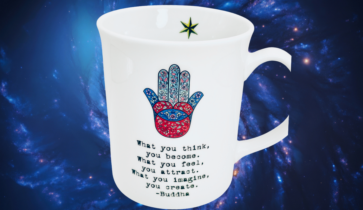 Buddha Hamsa Hand Inspirational Mug styled against cosmic galaxy background with spiritual aesthetic