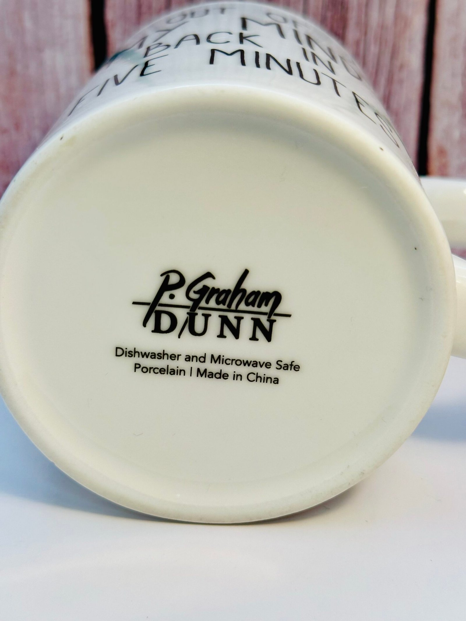 White ceramic novelty mug with humorous quote