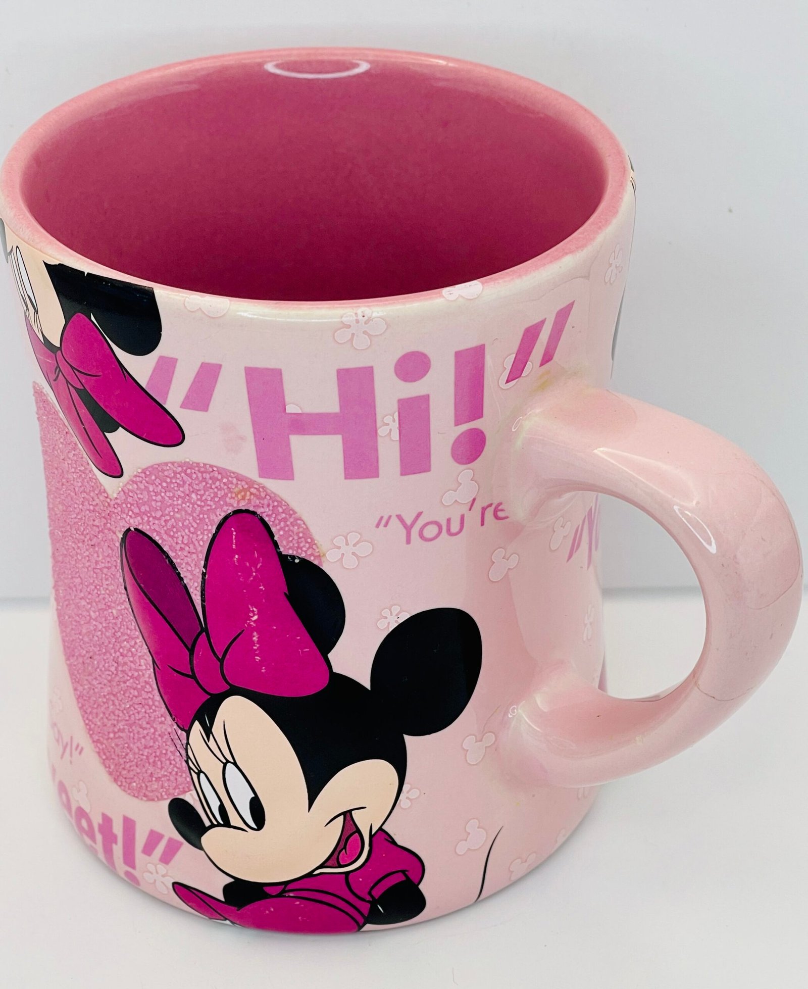 Pink glitter heart details on Minnie Mouse mug