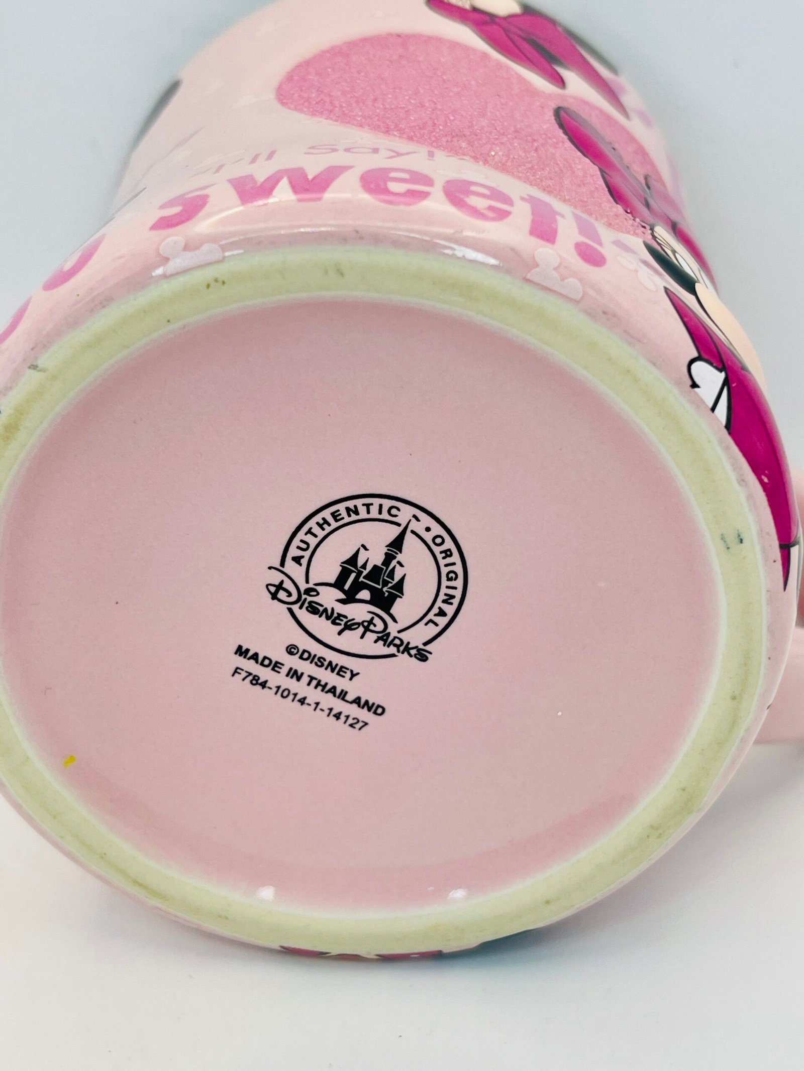 Pink glitter heart details on Minnie Mouse mug