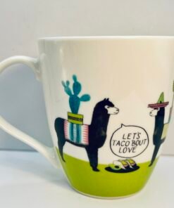 Close-up of ceramic llama mug with taco plate design