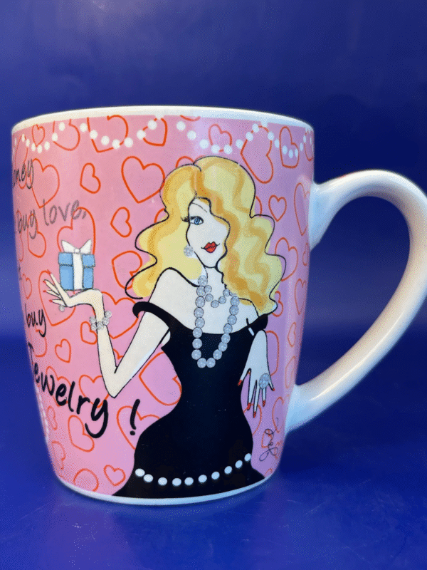 Unleash your inner glam with the Money Can Buy Mug by Delish. It’s the perfect #cupofmood that promises to redefine your sipping experience.