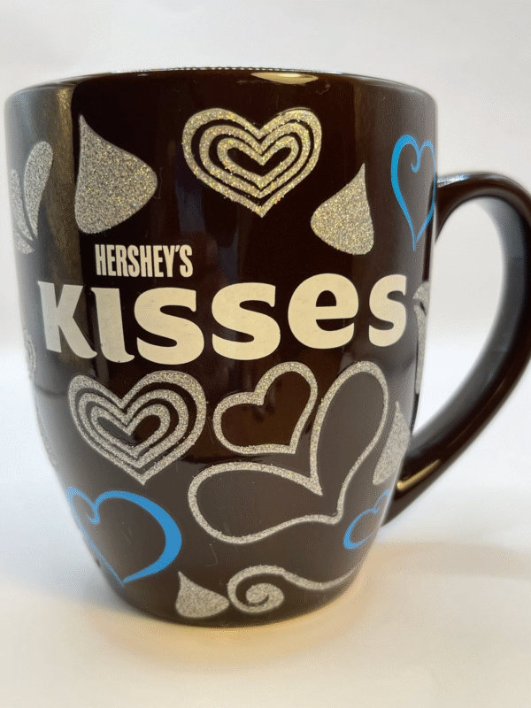 This Hershey’s Kisses Glitter Mug is the perfect #cupofmood for fans of Hershey’s kisses. This is a cute and glittery large brown coffee cup mug.