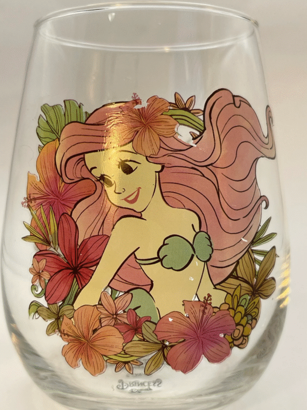 Unleash your inner mermaid with the Ariel Girl Everything Wine Glass. It’s the perfect #cupofmood a charming addition to the Disney Collection.