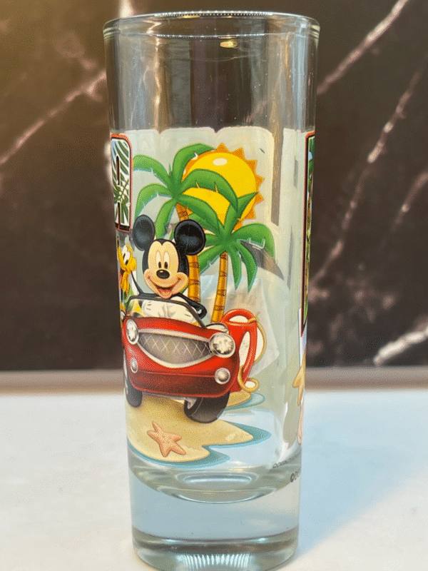Raise a glass to the magic of Disney with the Disney Florida Tall Shot Glass. It’s the perfect #cupofmood and your ticket to sunshine and Disney magic!