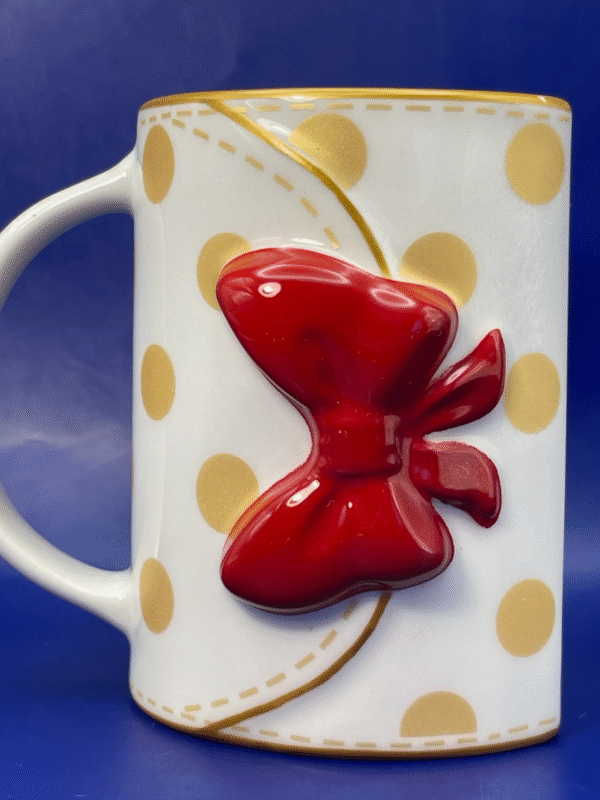 Elevate your coffee experience to a new level of chic with our 3D Minnie Mouse Purse Mug. It’s the perfect #cupofmood and rare gem from the Disney Store.