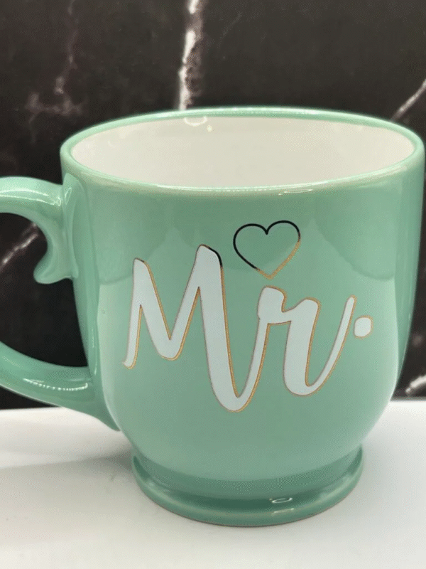 Raise a toast to a blend of elegance and charm with the Green White Mr. Pedestal Mug! 