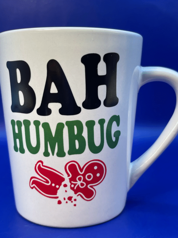 Infuse your holiday season with a touch of humor and a sprinkle of sass with the Bah Humbug Gingerbread Man Mug. It’s the perfect Scrooge #cupofmood.