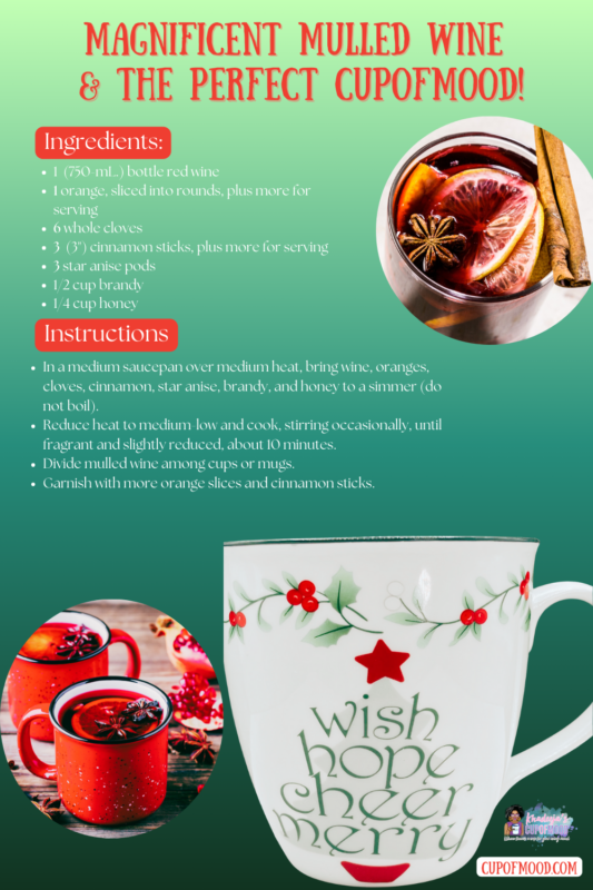 Pfaltzgraff 'Winterberry Merry' hand-painted mug filled with warm mulled wine and orange garnish