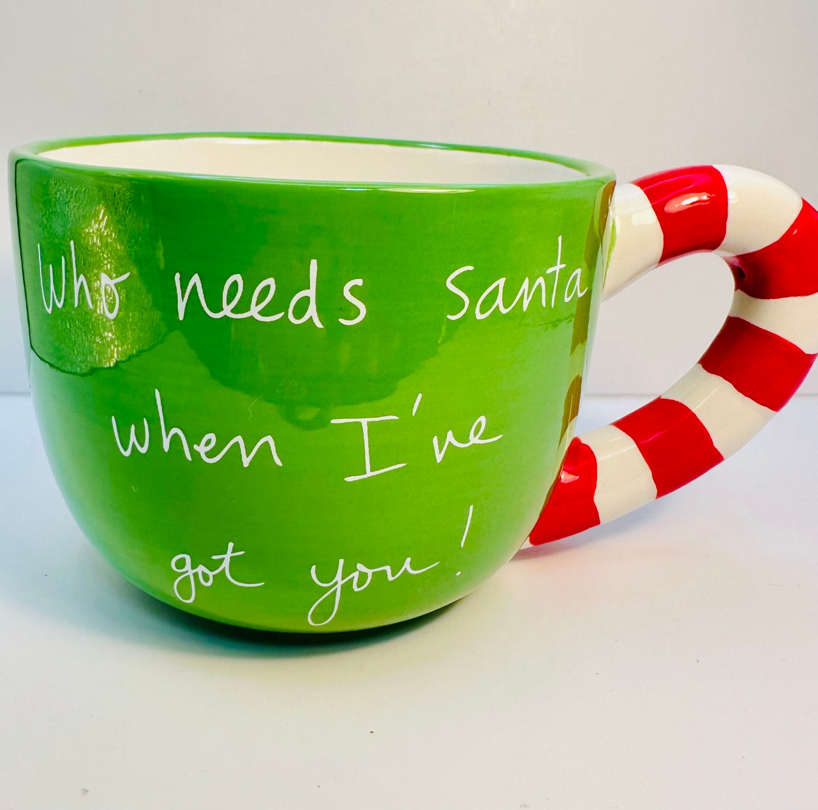 Green Sandra Magsamen Christmas mug with candy cane handle