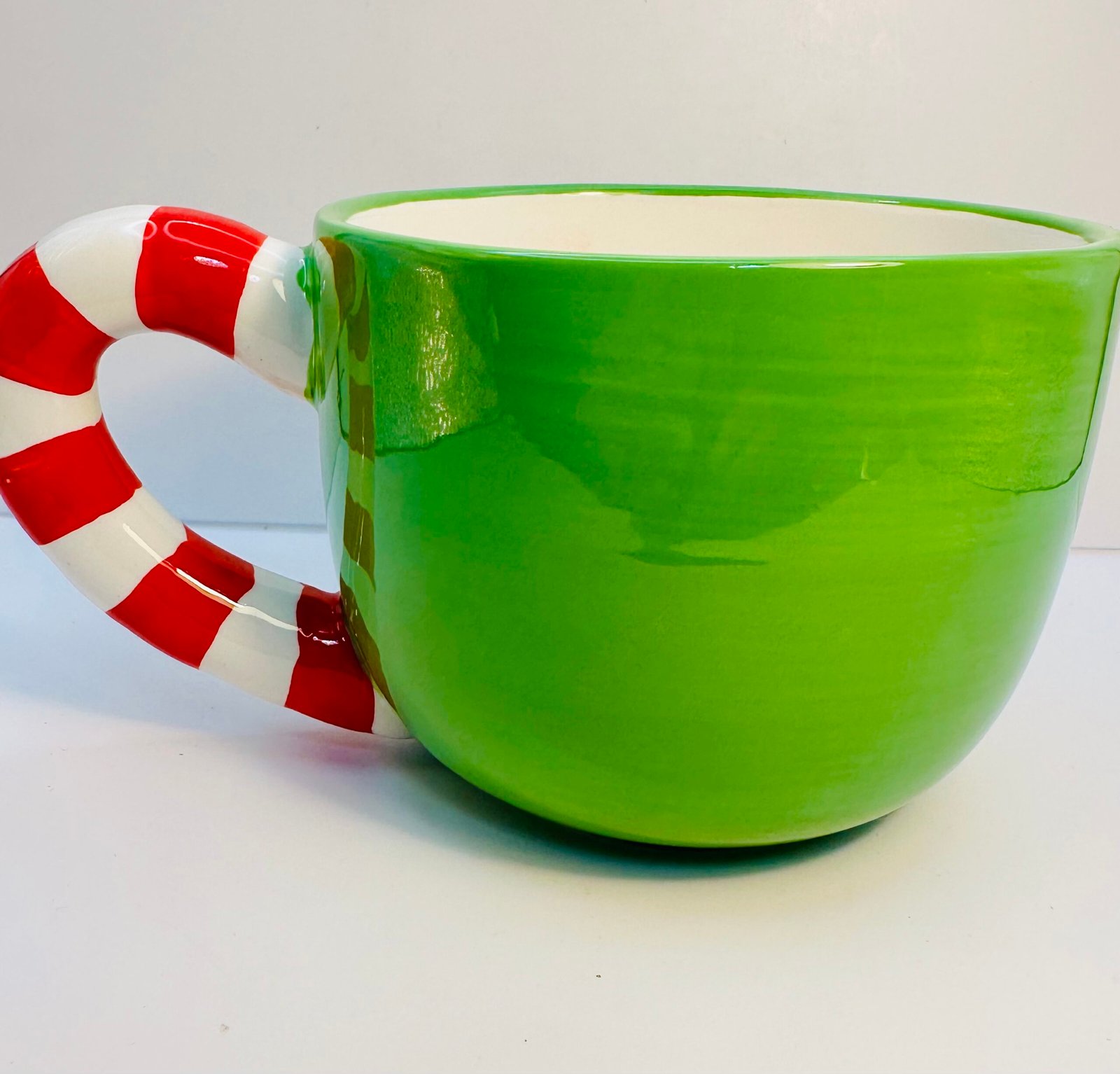 Funny holiday mug with white text