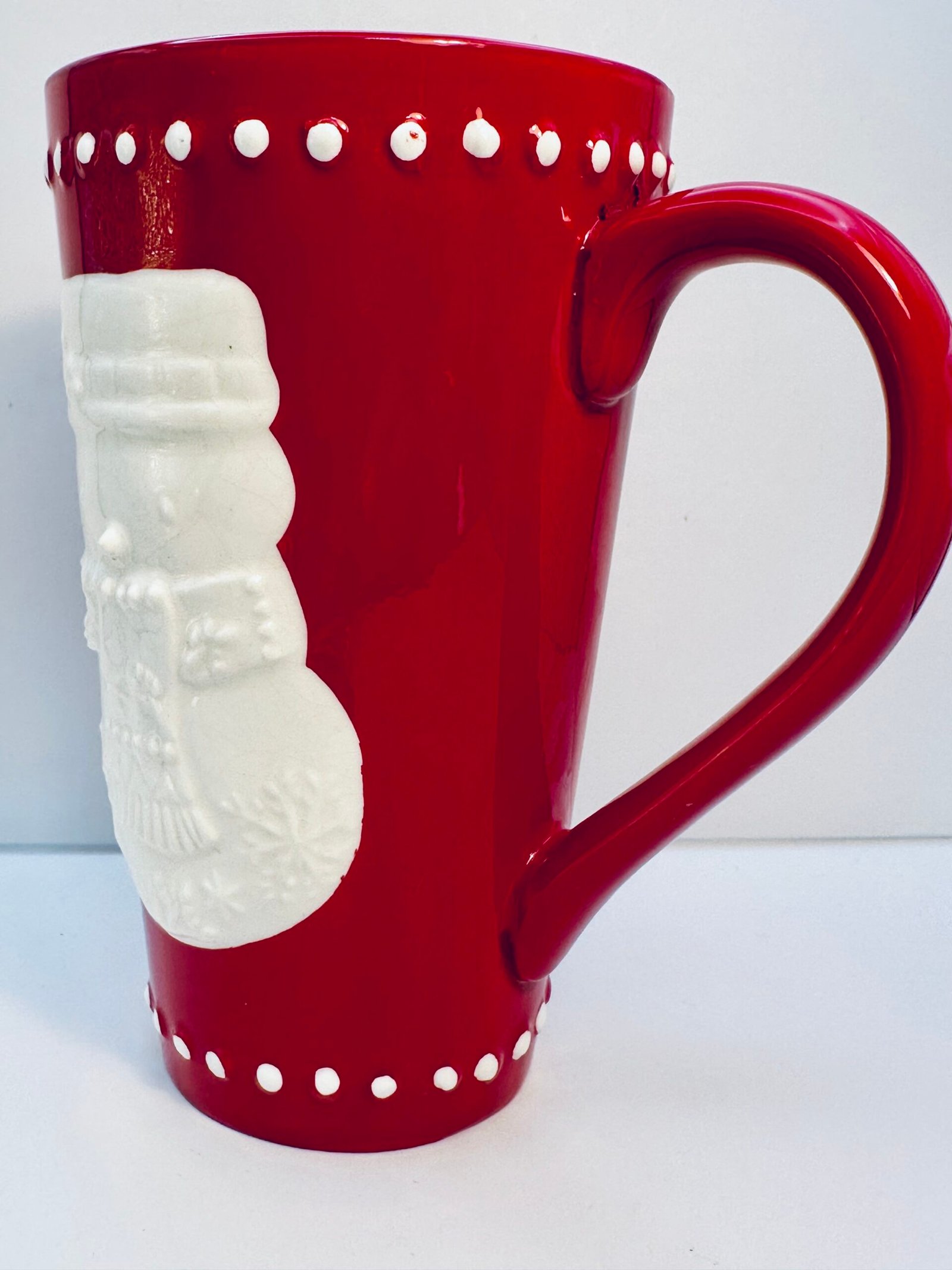 Raised snowman design holiday mug