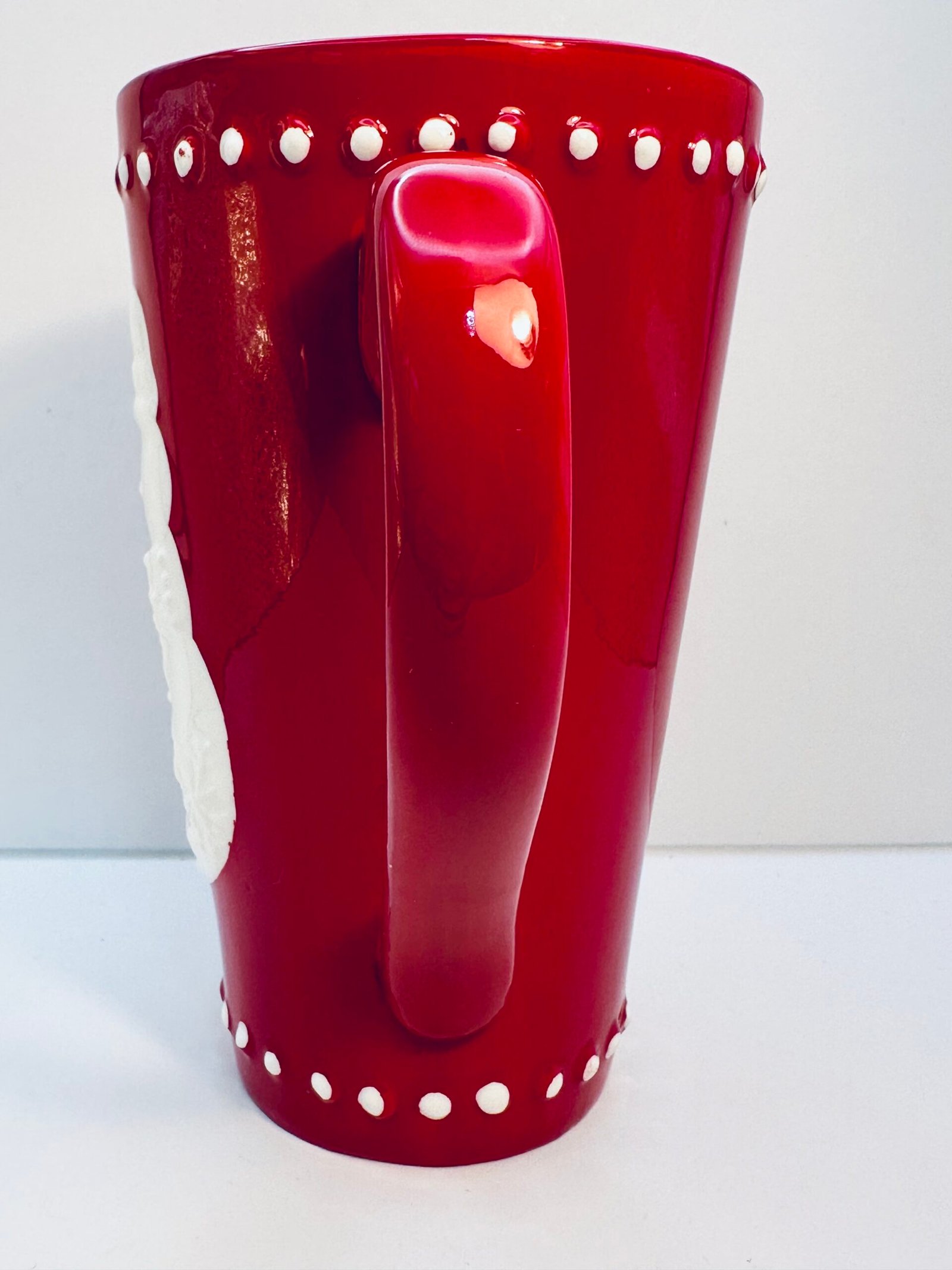 Red winter mug with embossed snowman