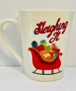 White ceramic Christmas mug with sleigh