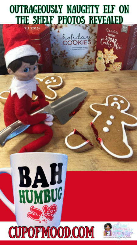 Naughty Elf On The Shelf cutting gingerbread cookie with Bah Humbug gingerbread mug.