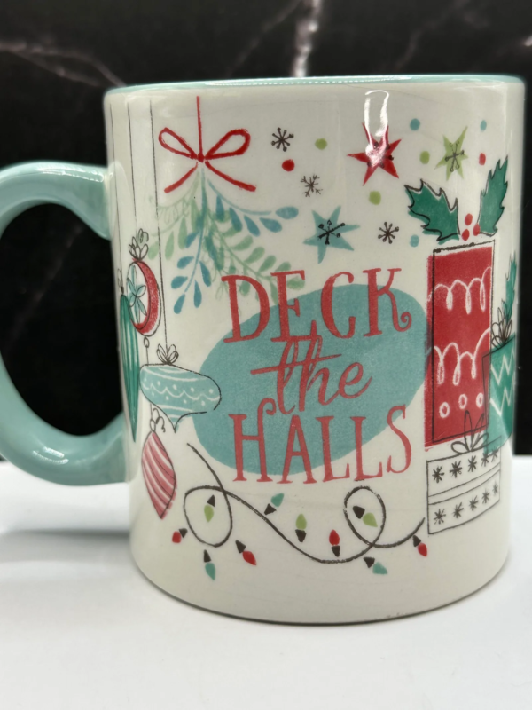 Celebrate the season in style with the Deck The Halls Christmas Mug. It’s the perfect #cupofmood and festive way to bring the Christmas spirit to your home.