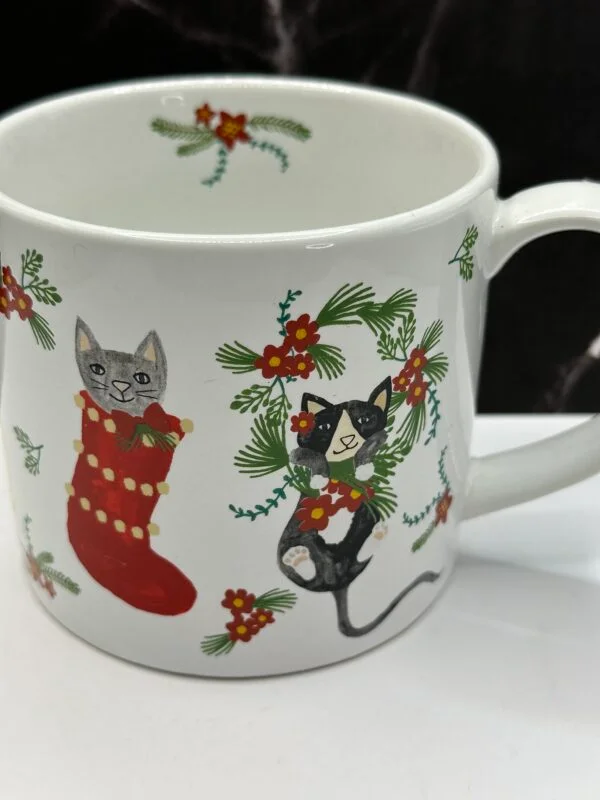 Get ready to add feline charm to your holiday with the Festive Christmas Cats Mug. It’s the perfect #cupofmood and a purr-fectly adorable holiday favorite!