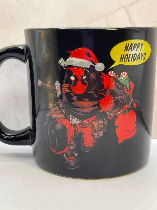 
The Here Comes Deadpool Holiday Mug is the perfect #cupofmood here to add a dose of Deadpool’s signature humor to your festivities.