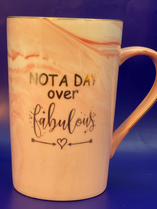 This Day Over Fabulous Pink Mug 12-ounce mug is more than just a vessel for your morning coffee. It’s a daily affirmation of your fabulousness!