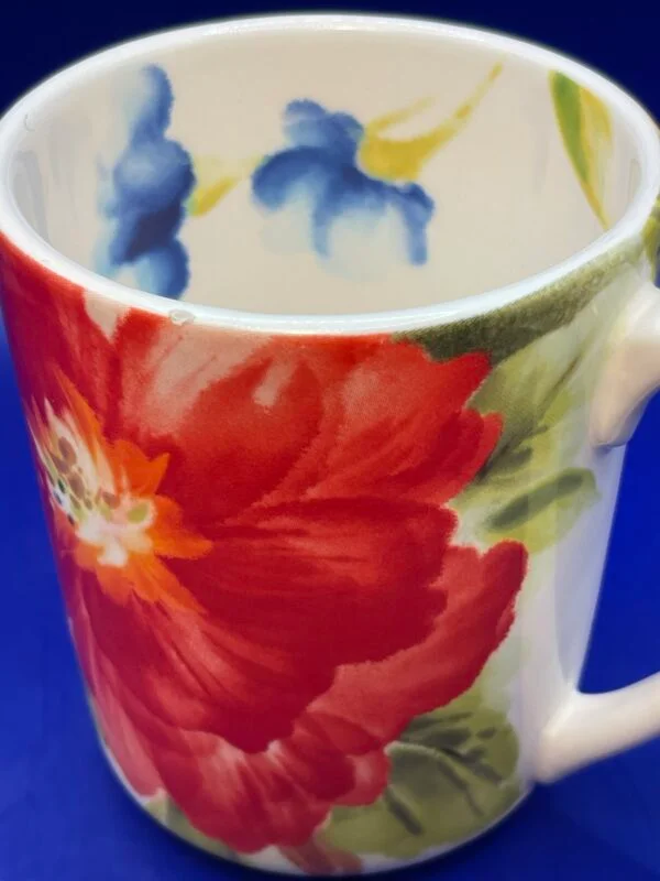 Bring timeless beauty to your morning ritual with the Pier 1 Amelia Floral Coffee Mug.