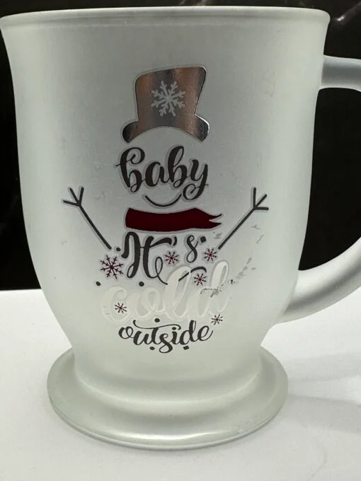 Embrace the chilly weather the festive way with the Baby Cold Outside Frosted Mug. It’s the perfect #cupofmood that combines functionality with charm.