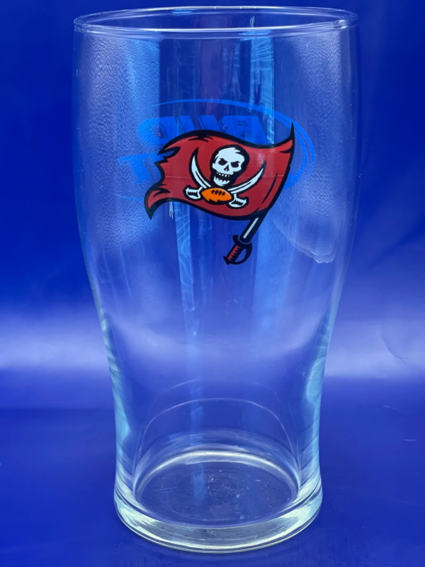 Elevate your game-day experience with the sleek and stylish Buccaneers Rounded Pint Glass. It’s the perfect #cupofmood for Bucs fans!