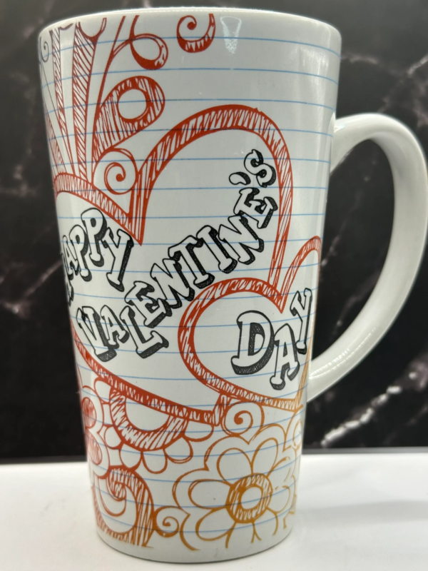 This charming 16-ounce Happy Valentine’s Day Doodles Mug is wrapped in a playful design that looks straight out of a notebook of heartfelt doodles.