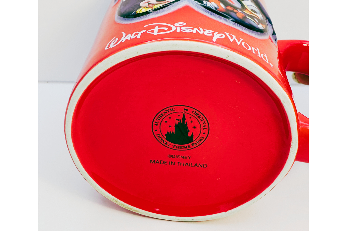 Bottom view of Walt Disney World 2006 3D embossed mug logo stamp