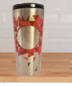 2014 Starbucks red gold tumbler styled in kitchen setting