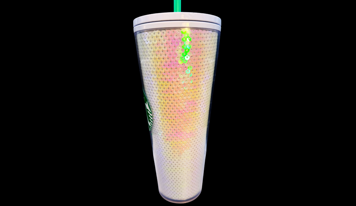 Starbucks 2020 Holiday Sequin Tumbler angled side view with lid and straw