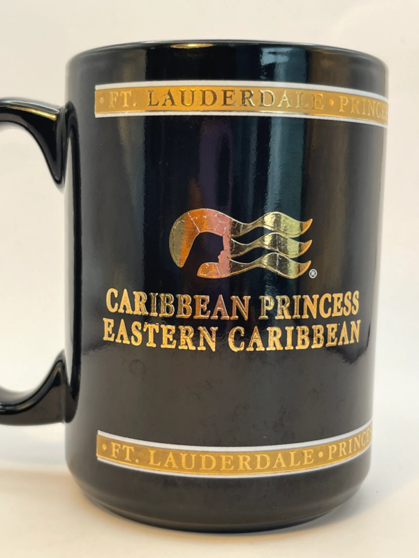 Crafted from from durable black ceramic. This 10-ounce travel Caribbean Princess Eastern Caribbean Mug is adorned with the iconic Princess Cruise line Sea Witch logo in radiant gold, exuding luxury and sophistication.