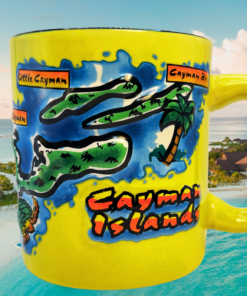 Back view of the mug featuring a smooth yellow ceramic surface that balances the bold front design.