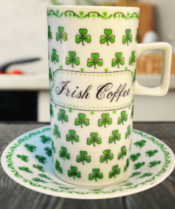 Bottom view of the Irish Coffee cup showing the ceramic base with the number 1342 printed on the underside while resting on the matching shamrock decorated saucer.