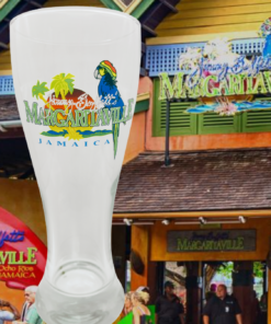 Margaritaville Jamaica pilsner glass styled with tropical bar setting