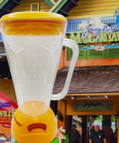 Margaritaville blender cup styled on tropical bar counter