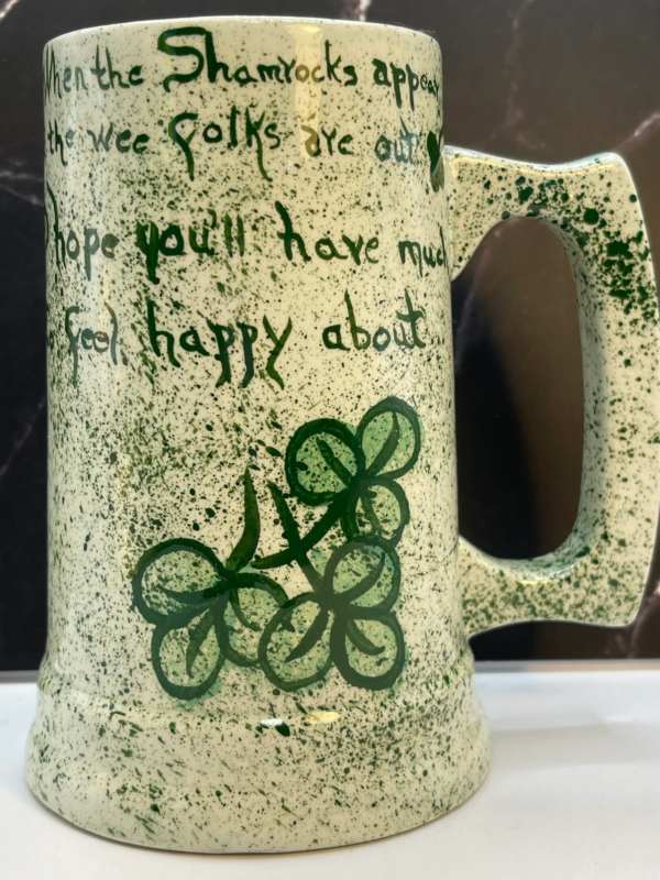 This hand painted shamrock mug features speckled ceramic and traditional Irish symbolism. The rustic finish and shamrock artwork create a warm pub-style coffee mug perfect for celebrating St. Patrick’s Day.