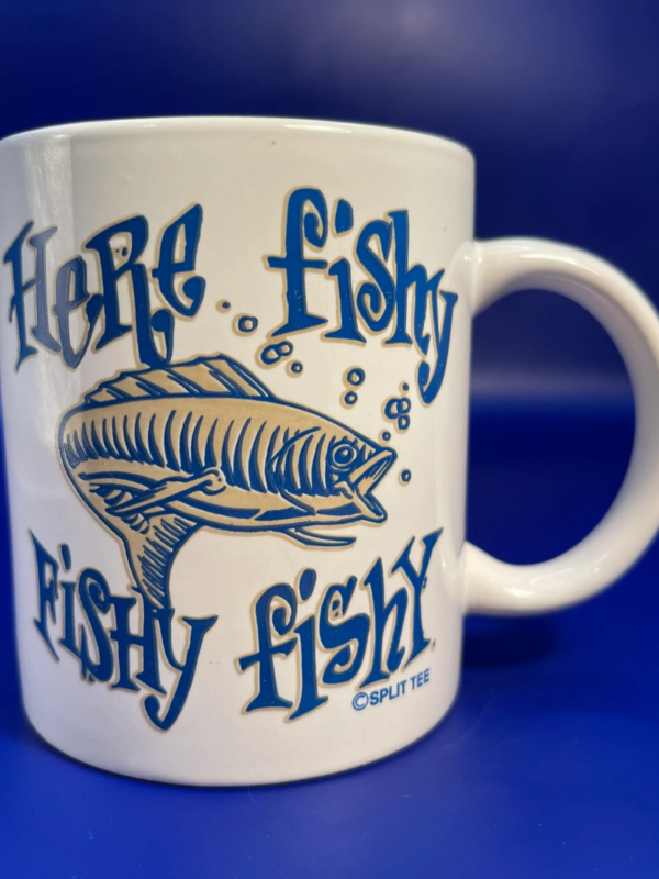 This Here Fishy Mug is the perfect gift mug for people who like coffee cups with funny fish sayings. This is a whimsical Mug with Funny Fish Saying.