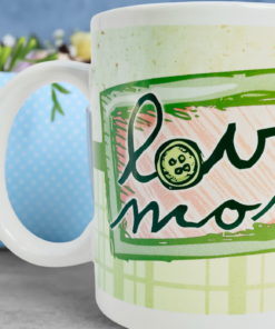 I love you mom floral plaid mug styled with blue gift bag and flowers in background