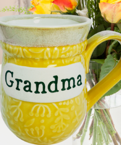 Cracker Barrel grandma mug with flowers on kitchen table