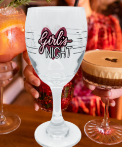 girls night party wine glass styled with drinks and friends night setting