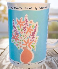 Russ Berrie mothers love floral mug styled on wooden table with flowers cozy kitchen scene