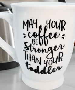 funny mom mug on kitchen counter with coffee maker and moka pot