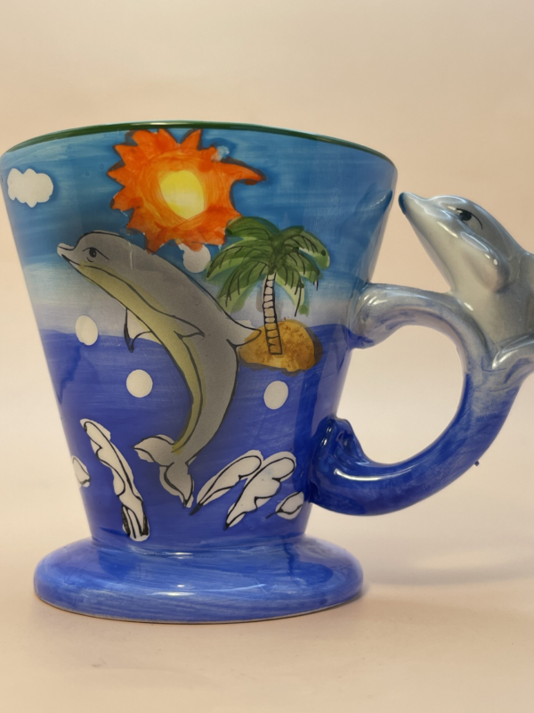 Discover the ultimate blend of artistry and functionality with our 3D Jumping Dolphin Mug. It’s the perfect #cupofmood for Dolphin Lovers.
Indeed, this 10-ounce marvel is not just a mug. It’s a daily escape to tropical paradise.